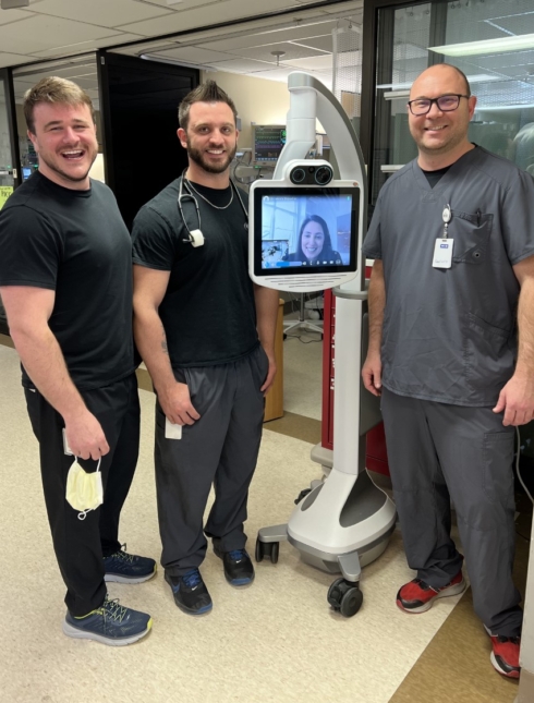 Clinicians with telemedicine cart